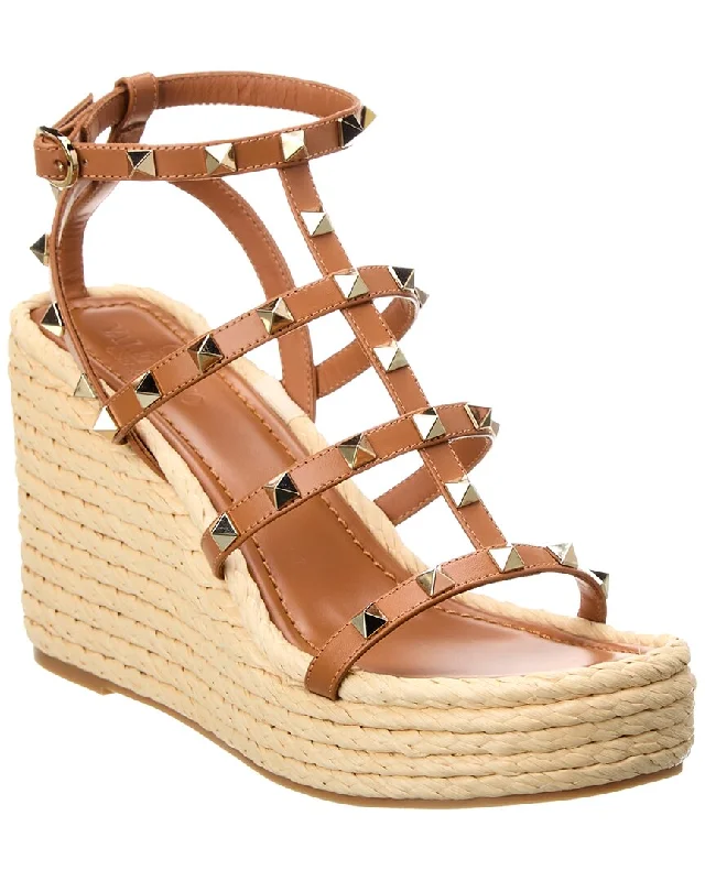 Eastern Sandals-Comfortable sandals with supportive footbed-Valentino Rockstud Caged 95 Leather Wedge Sandal